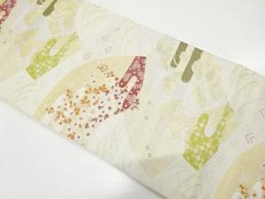 地紙に菊・芝草・松模様織り出し　袋帯